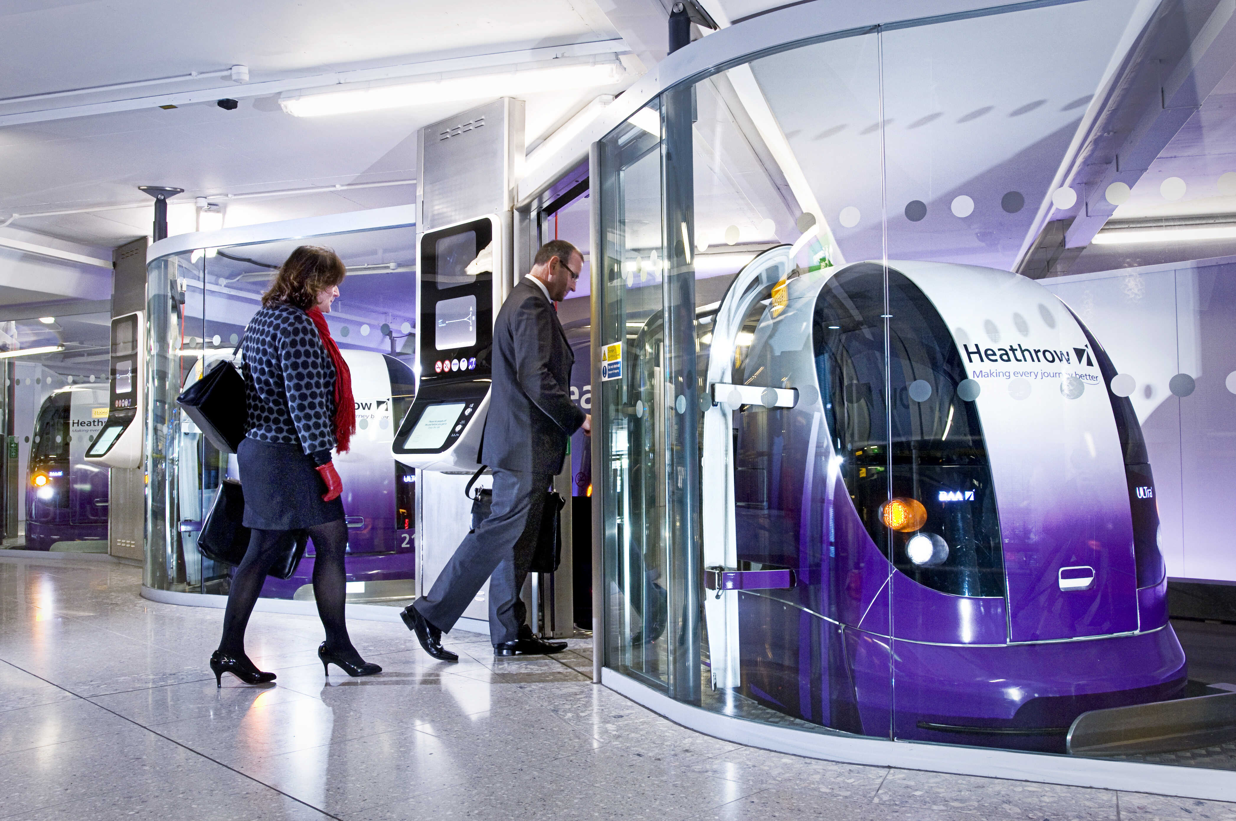 passenger entering self-driving pod