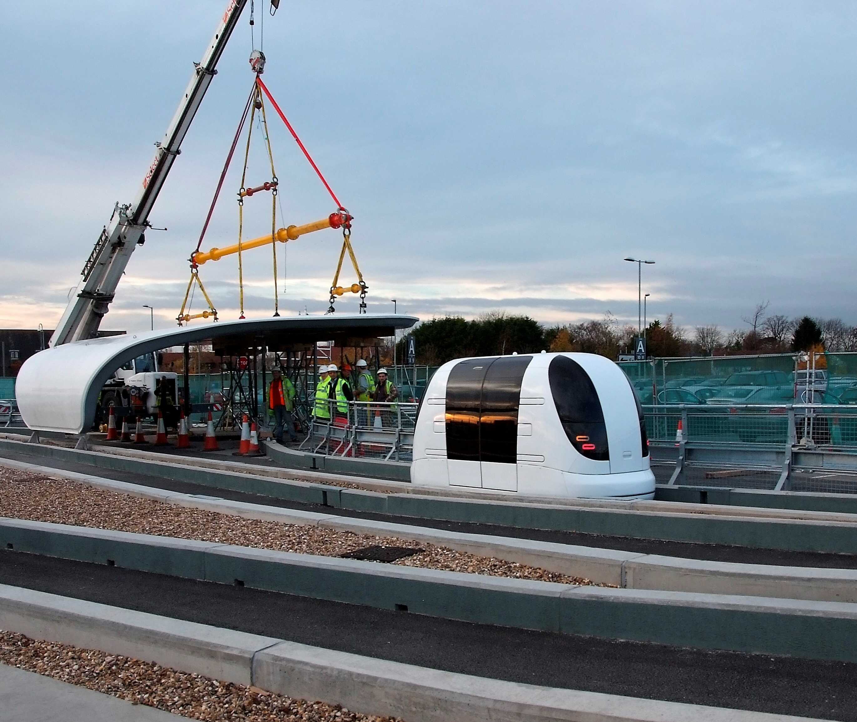 driverless pod leaving station